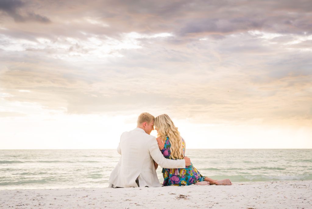 Clearwater Beach Photographer Sitting down looking at sunset